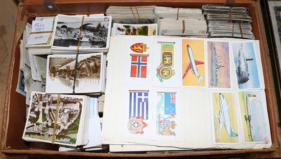 Small suitcase of 1930s & earlier sets of cigarette cards, including railway crashes, topographical etc.